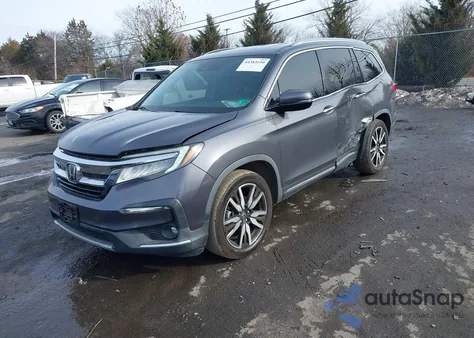 2019 Honda Pilot Touring z USA, uszkodzony, nr VIN 5FNYF5H99KB033617